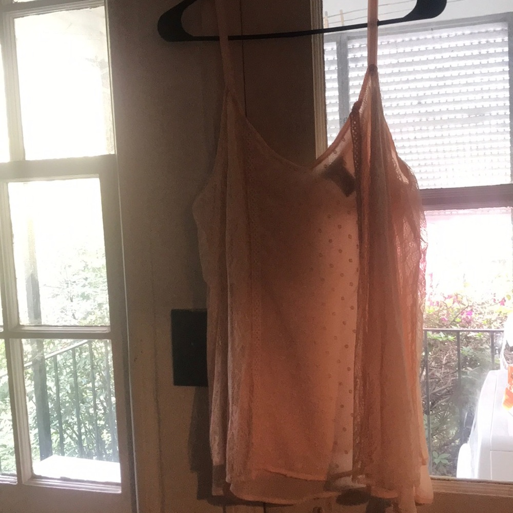 Pink sleeveless blouse